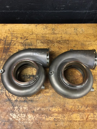 Load image into Gallery viewer, New Pair of TiAL Stainless V-Band Housings (1.15 A/R)