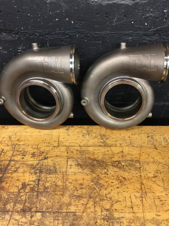 Load image into Gallery viewer, New Pair of TiAL Stainless V-Band Housings (1.15 A/R)